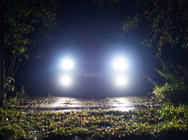 Spotlights illuminating trail from Land Cruiser 100 Series